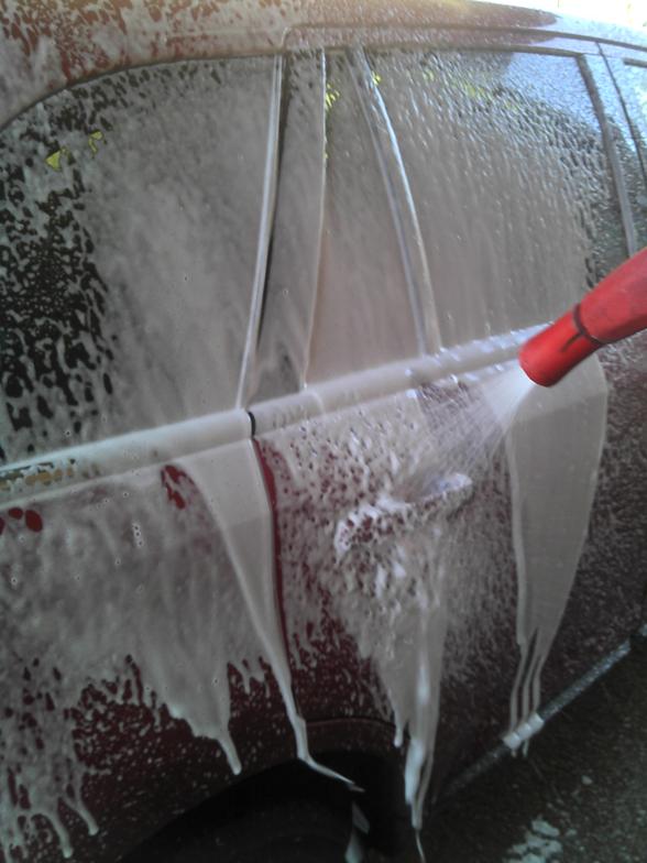 Foaming presoak spray nozzle